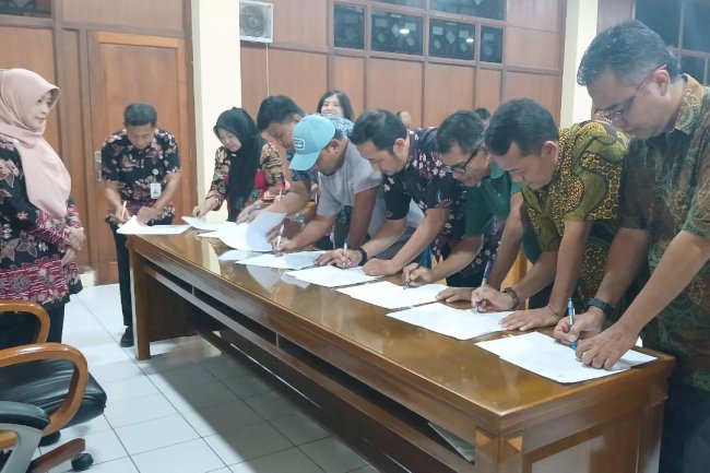 Penandatanganan PK dan PI